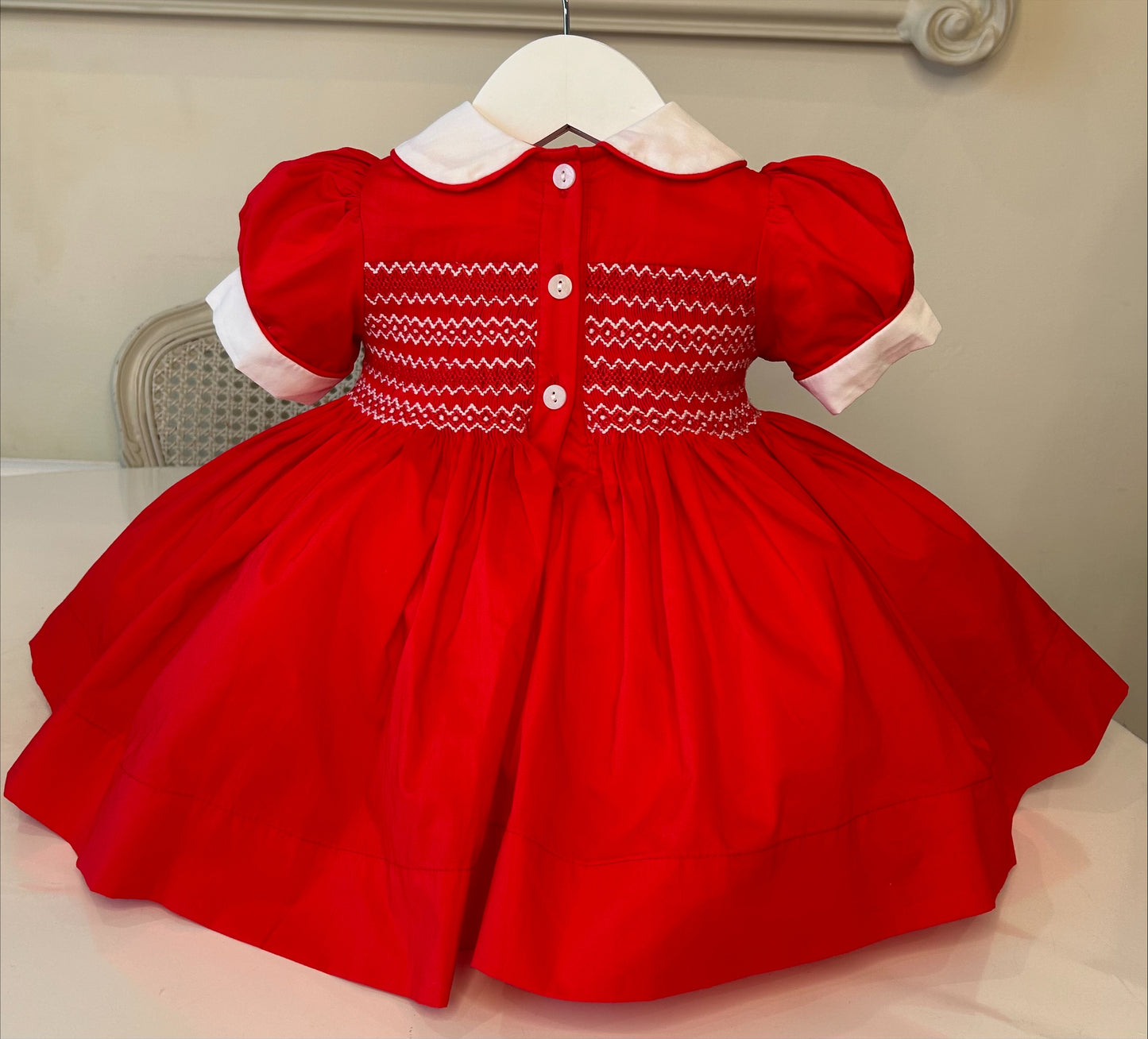 Red and white smocked dress